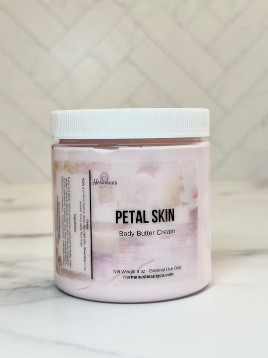 Jar of Petal Skin body butter cream on a marble surface with a neutral background