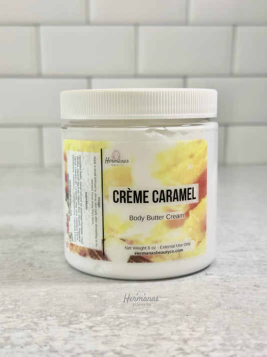 Jar of Crème Caramel body butter cream on a tiled wall background