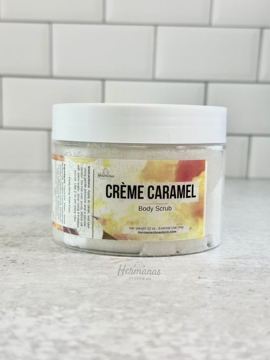 Jar of 'Cèreme Caramel' body scrub on a tiled bathroom counter